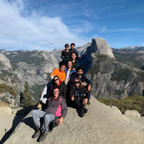Hiking in Yosemite with a view of Half Dome